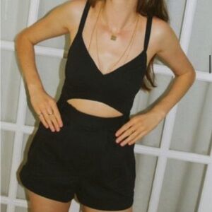 21. Urban Outtitters Dora CutoutRomper Brown Size: M